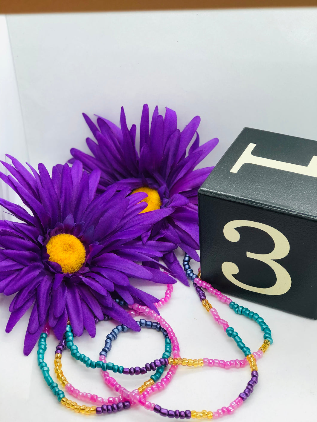 “Journey” Waist Beads with clasps Aqua, Purple, Gold, Pink & Dark Purple Beads